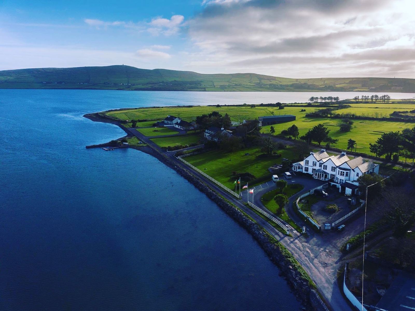 Milltown House on its waterfront lawns, Dingle Harbour, from the air