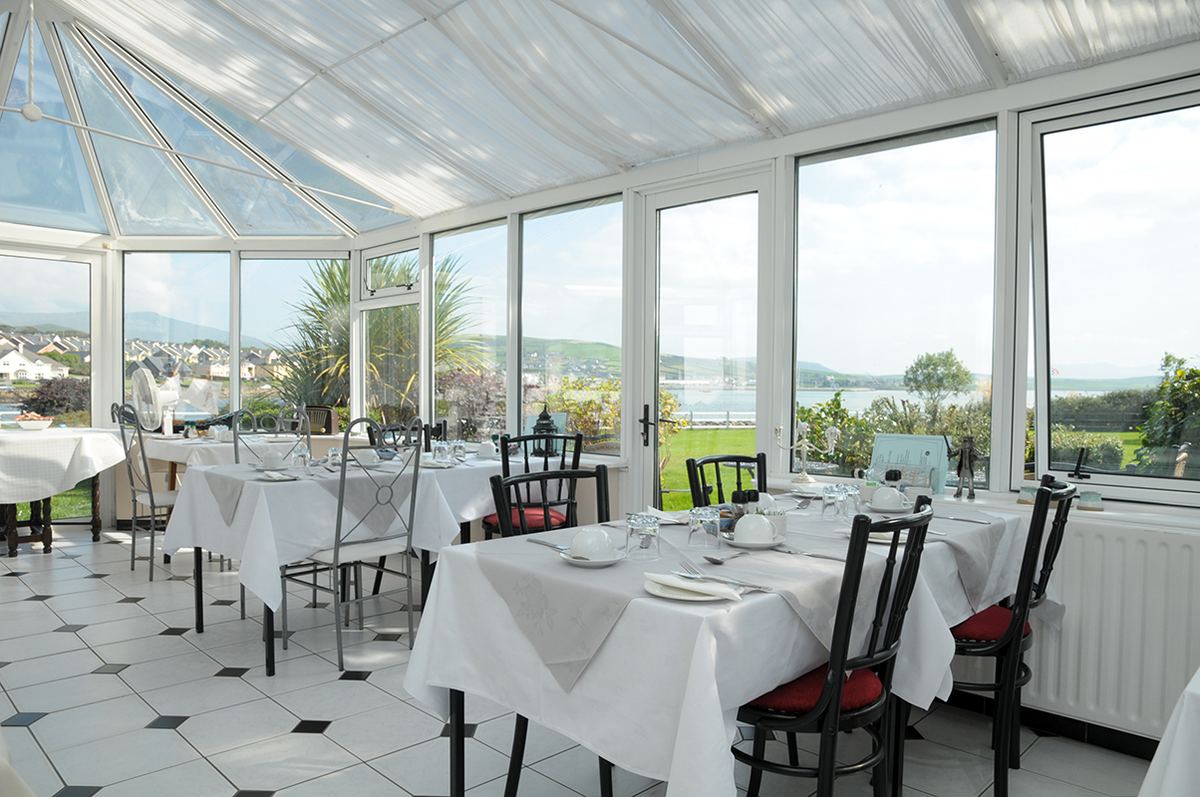 The conservatory at Milltown House, looking over Dingle Bay